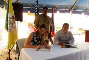 Transfer documents being signed